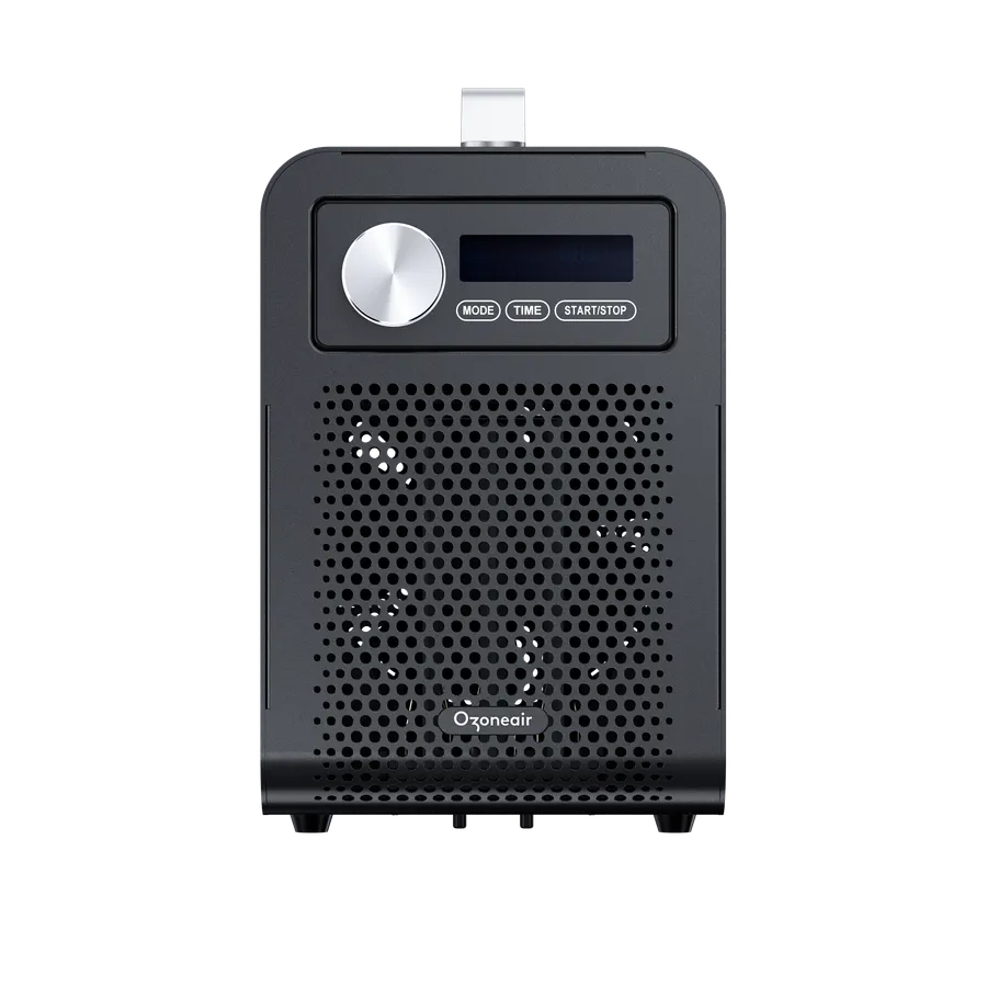 Black Ozoneair Clean 30 ozone generator seen from the front, with a round metal dial, a display and MODE, TIME and START/STOP buttons above a perforated front panel, and a carry handle on top.
